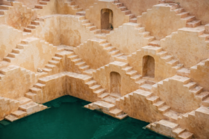 India ancient step well with emerald pool