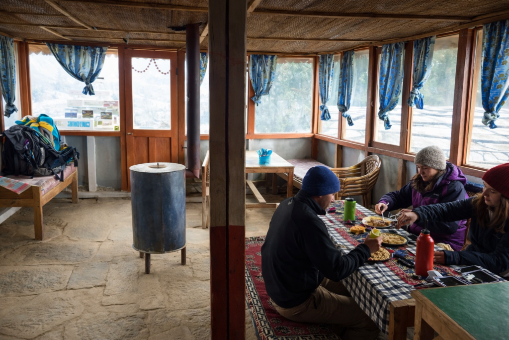 Mountain-lodge-dining-with-trekkers