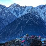 snow-peaked-mountain-and-village-in-explore-himachal-pradesh-guide