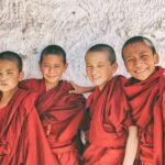 four-young-monks-in-red-drapes-experiences-in-Ladakh