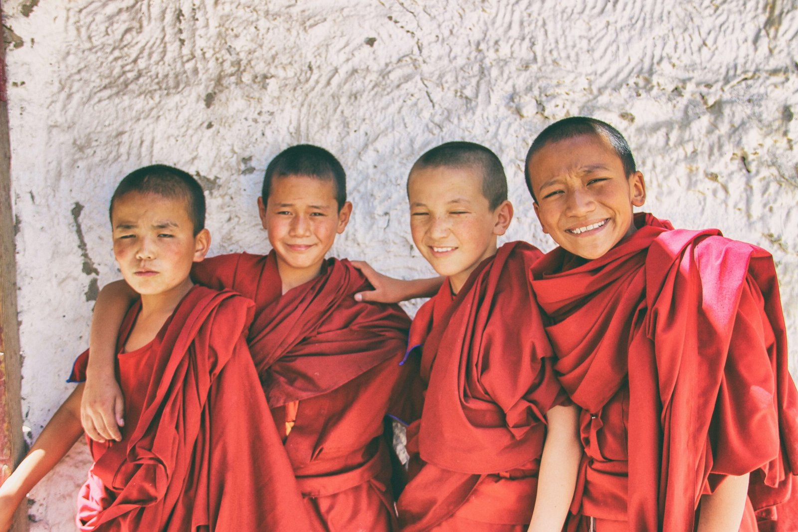 four-young-monks-in-red-drapes-experiences-in-Ladakh