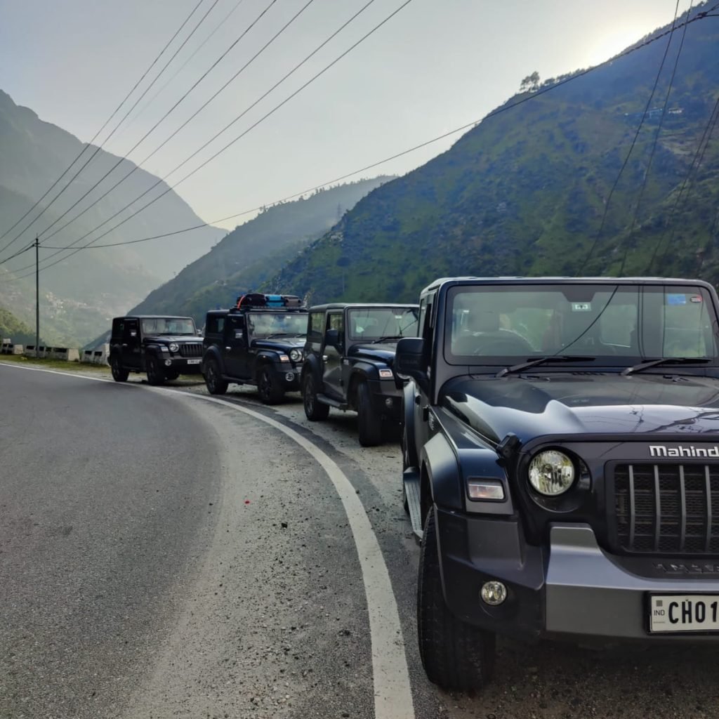 convoy-of-mahindra-jeep-by-the-kerb