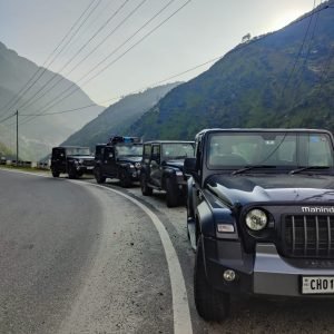 convoy-of-mahindra-jeep-by-the-kerb