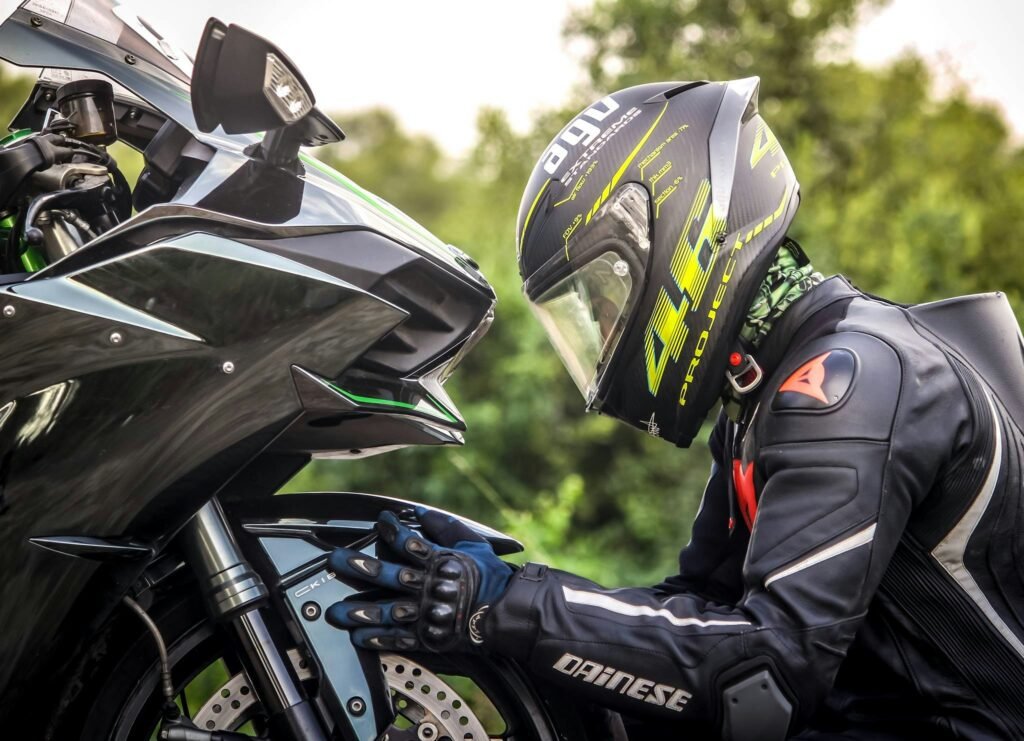 rider-in-helmet-face-to-face-with-a-motorcycle-motorcycle-expedition-planning